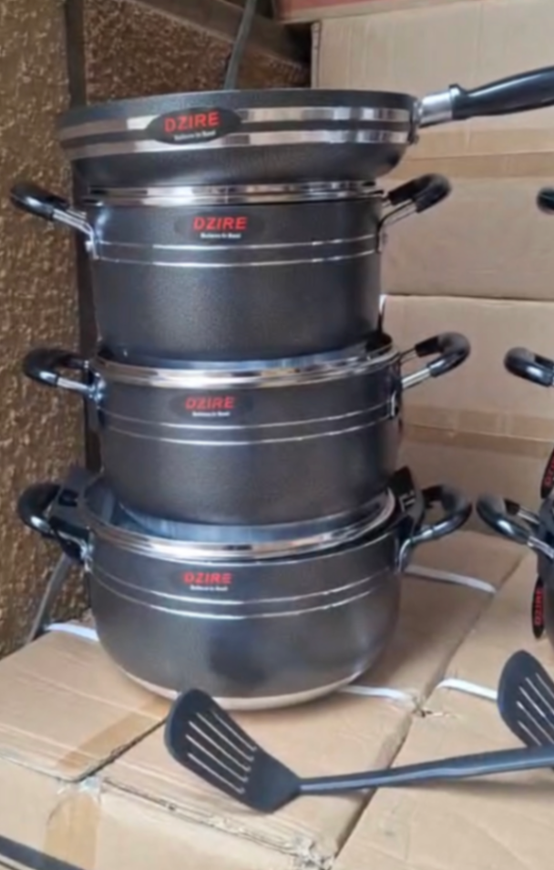 8Pcs Dzire Nonstick Cookware Sizess: 24cm, 26cm, 28cm, 28cm frypan 3 Pots 3 Glass Lids 1 Fry Pan 1 Kitchen Spoon